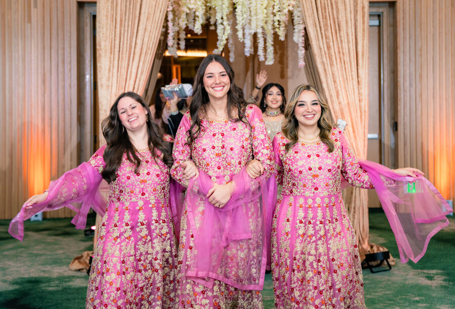 Guests dancing at a mehndi celebration